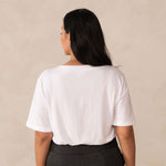 woman wearing a white short sleeve t-shirt