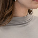 The Going Places Bracelet Sleeve Mock Neck