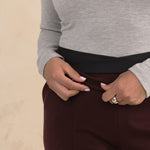 waist details of a tailored aubergine pants