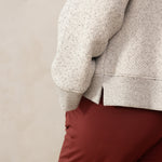 Close up of detail of a white sweater