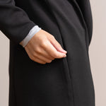 Pocket detail of black jacket