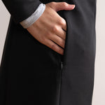 Pocket detail of black jacket