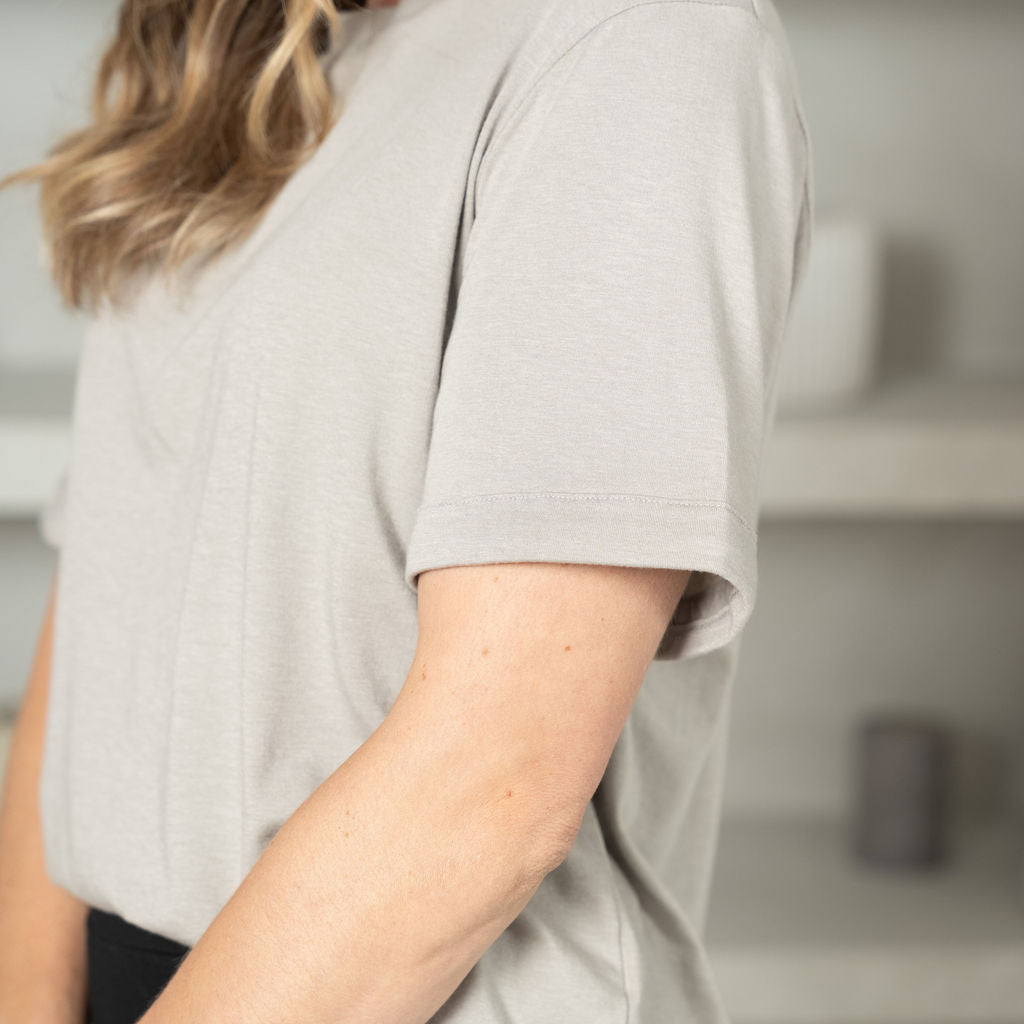 sleeve detail of a light grey t-shirt