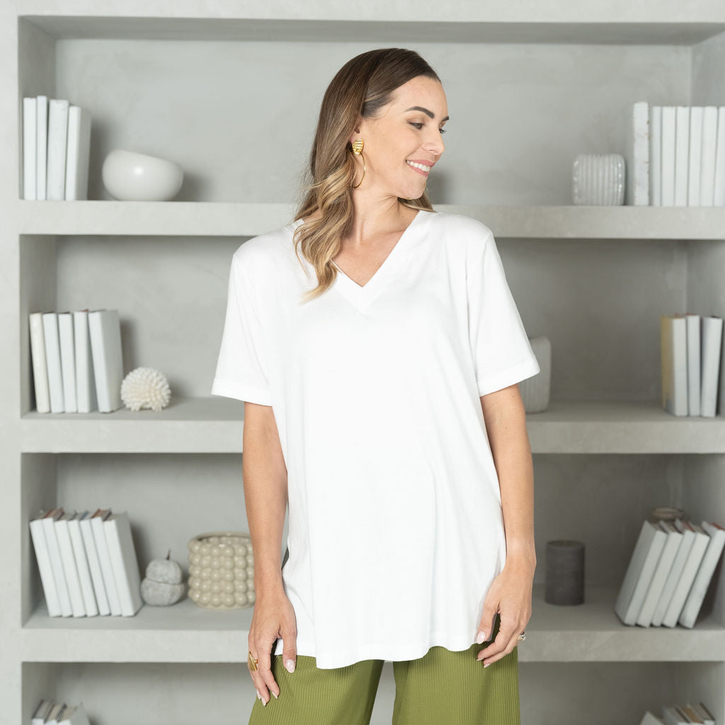 woman wearing a white v-neck t-shirt