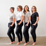 4 woman wearing t-shirt and black sweatpants