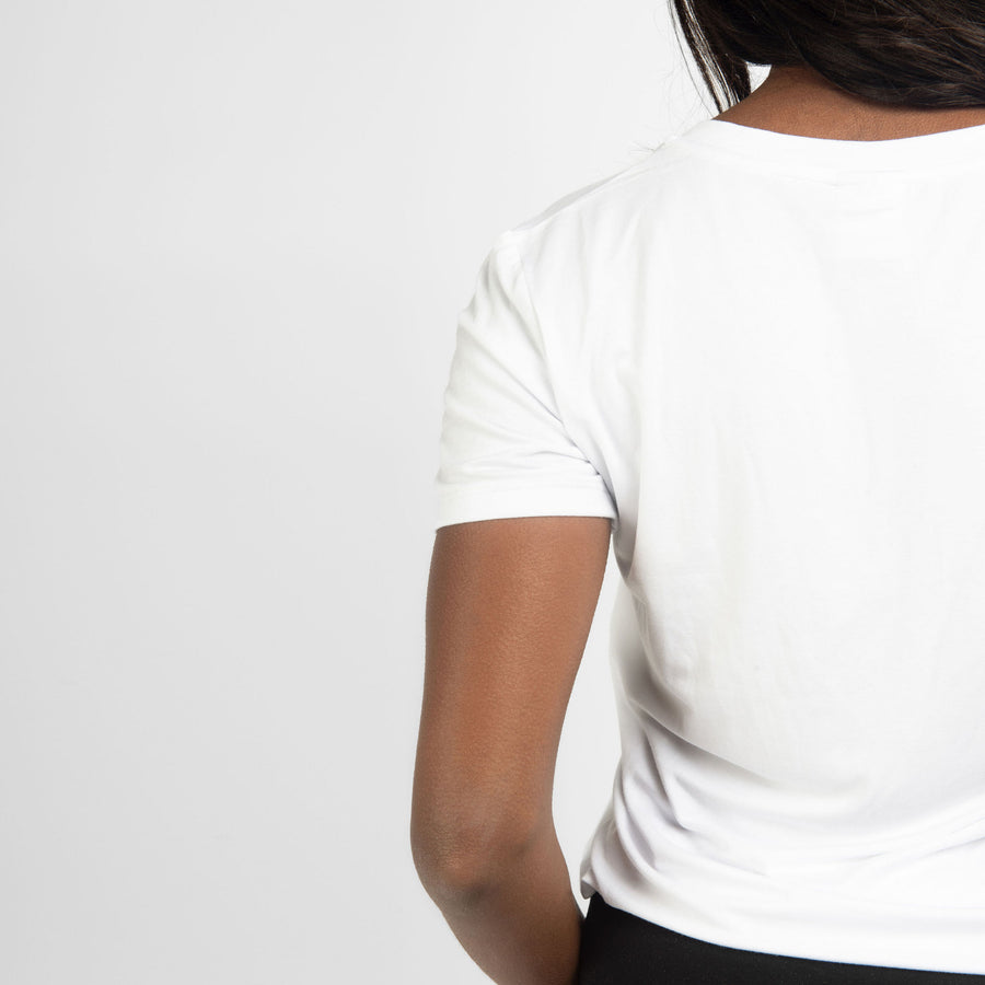 Woman wearing white v-neckline t-shirt